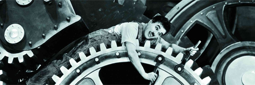 particolare foto Chaplin dal film Tempi moderni